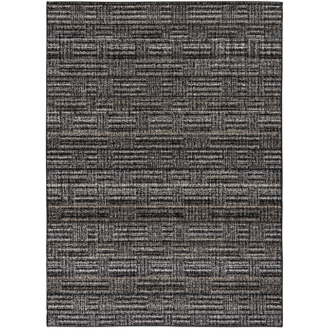 Mainstay Machine Washable Collage Black 30x48 indoor area rug with a loop-on-loop woven texture in space-dyed black, grey, and brown yarns, featuring stain resistance and non-slip backing, suitable for kitchen mats and high-traffic indoor areas.