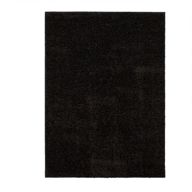 Hometrends Gray Willow Creek Polyester Area Rug in a top-down view showing a solid dark gray shag texture made of 100% polypropylene, sized 5 by 7 feet, designed for stain resistance and softness, ideal for home accent areas.