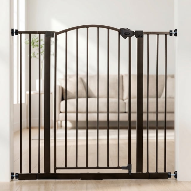 Regalo 36" Extra Tall Metal Baby Gate, Fits 29-39.5" Wide, Arch Doorway, Bronze. 36-inch all-metal pressure-mount gate with bronze finish, two 4" extension kits, walk-through door opens both directions with safety lock and wall cups. Recommended for ages 6–24 months.