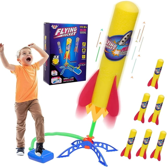 PENGXIANG Kid Air Rocket Launcher Toy Gift with 6 foam rockets designed for children aged 3 and up. This foam blaster set includes a durable yellow foam rocket with red fins and a sturdy blue base for stable launches. A child is shown stepping on the launcher pedal, demonstrating outdoor play. The packaging features vibrant graphics and gift box specifications, making it ideal for gifting.
