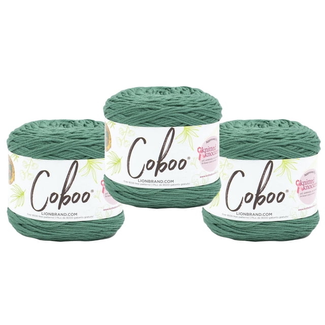 Lion Brand Coboo Yarn in three skeins of green cotton and bamboo blend yarn with white labels showing the Coboo logo and leaf designs, a natural fiber yarn known for excellent drape and stitch definition, ideal for year-round garments and home décor.