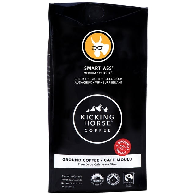 Kicking Horse Coffee Smart Ass Medium Roast 284g Ground coffee bag in black with the white mountain logo and a yellow circle showing a donkey wearing glasses, labeled cheeky, bright, and precocious, certified organic and fairtrade, suitable for filter drip and other brewing methods.