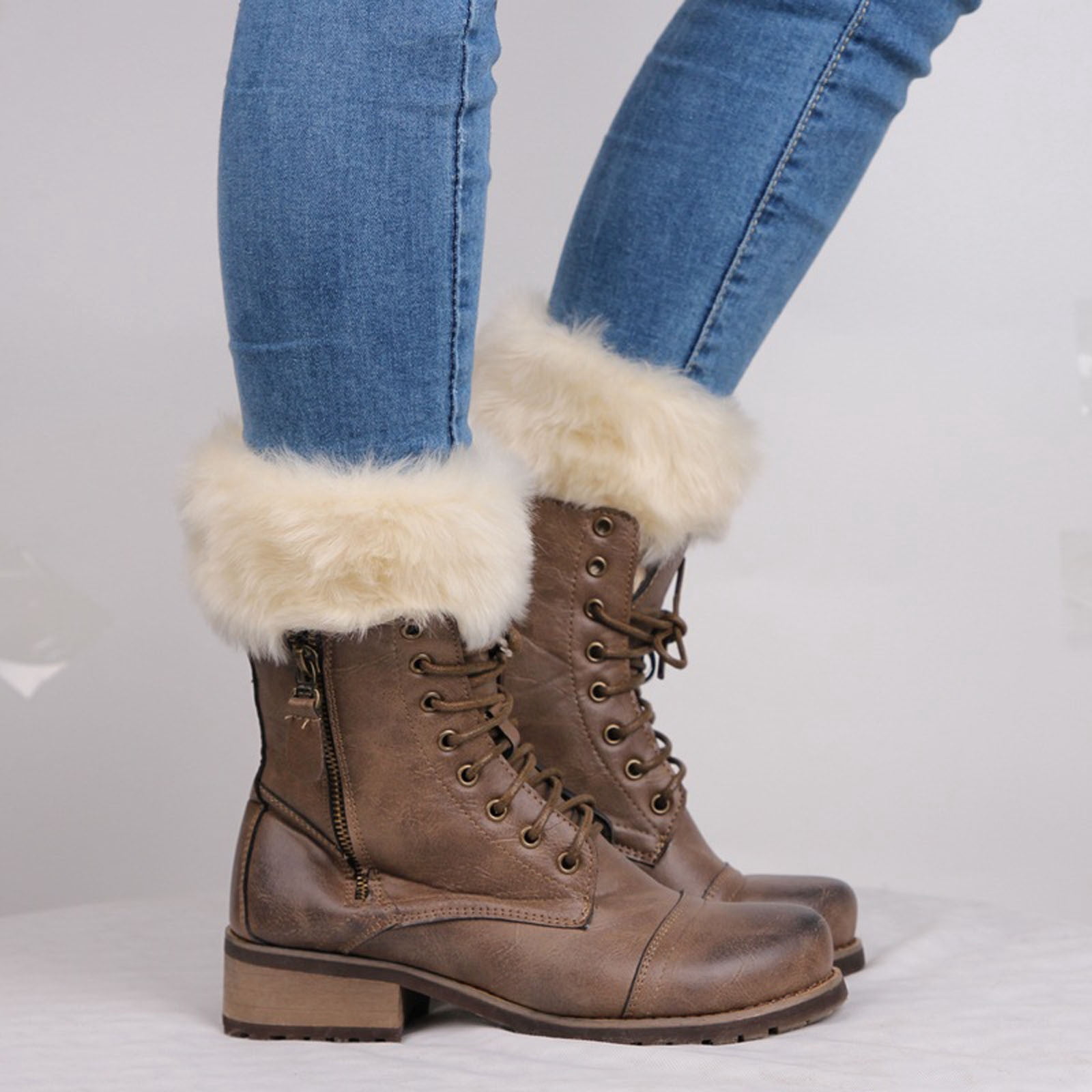 Woman in winter boots and a cozy turtleneck outfit