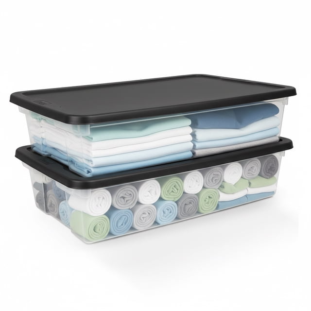 HOMZ 2-Pack Snaplock, Large Clear Plastic Storage Bins with Lids, 41 Quart, Gray. Two clear storage bins with black snap-close lids, shown stacked and filled with folded and rolled fabric. The bins feature a modular design with recessed lids for secure stacking, ideal for organizing clothes, blankets, or household items. Made from 90% recycled materials, suitable for use in bedrooms, kitchens, or dorms.