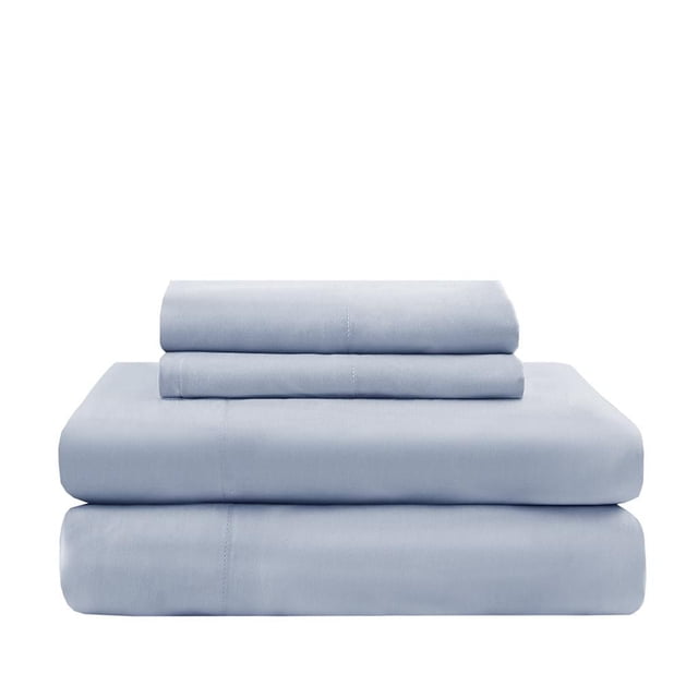 Madison Park 4 Piece Rayon from Bamboo Sheet Set in solid light blue, folded with one flat sheet, one fitted sheet, and two pillowcases stacked on a white background, made from breathable, moisture-wicking rayon from bamboo fabric ideal for cool, comfortable bedding.