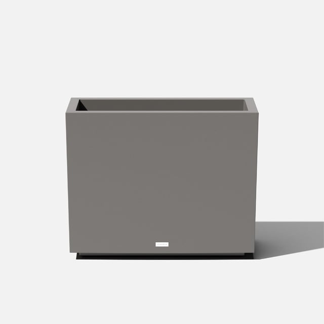 Veradek Block Series Span Short Plastic Planter in gray, featuring a modern rectangular design with a smooth finish. Made from durable, fade-resistant polypropylene plastic, this planter includes a removable insert bucket for easy planting and pre-drilled drainage holes. Ideal for use as a patio accent or privacy divider, it is impact and crack-resistant, with double-walled construction for added durability. Suitable for extreme temperatures ranging from -20 to +120 degrees Celsius.