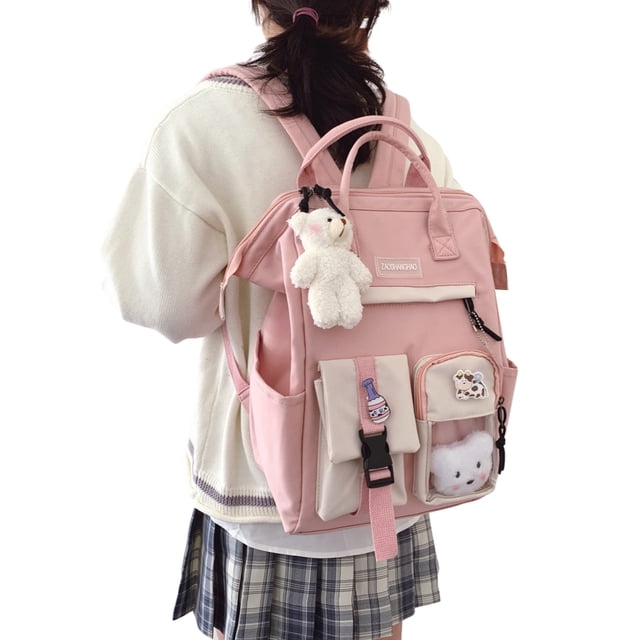 Diconna Women's Lightweight Backpack Daypack Large Capacity School Bag in pink nylon material, featuring multiple pockets, adjustable straps, and decorative bear pendant. Stylish and multi-purpose, ideal for students, casual outings, and daily use.