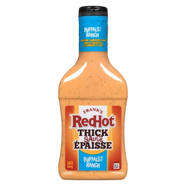 Frank's RedHot Buffalo 'N Ranch Thick Hot Sauce in a 354 ml squeezable bottle with creamy orange sauce, featuring a blue neck label and a front label with bold red and black text, ideal for dipping, topping, and cooking with buffalo heat and ranch creaminess.