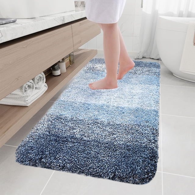Ihhxbz Big Deals Items Living Room Bedroom Flocking Carpet Plushes Rug Bathroom Absorbent Non Slip Mats Kitchen Foot Mats Machine Wash Bathroom Rugs for Bedroom Bath Tub and Shower. A blue polyester bathroom rug set measuring 15.7x31.4 inches, displayed in a modern bathroom. The rug features a soft microfiber texture with a gradient design, high water absorbency, and non-slip rubber backing for safety. Ideal for bathrooms, kitchens, and other wet areas.