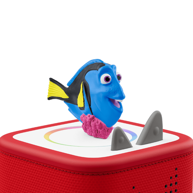 Disney & Pixar : Figurine Dory Tonie Montrant un Poisson tang Bleu avec des Nageoires Jaunes et des Yeux Larges sur une Toniebox Rouge avec une Toupie Blanche et un Anneau Coloré, Offrant un Récit Sans Écran et un Jeu Électronique Éducatif pour les Enfants de 3 Ans et Plus.