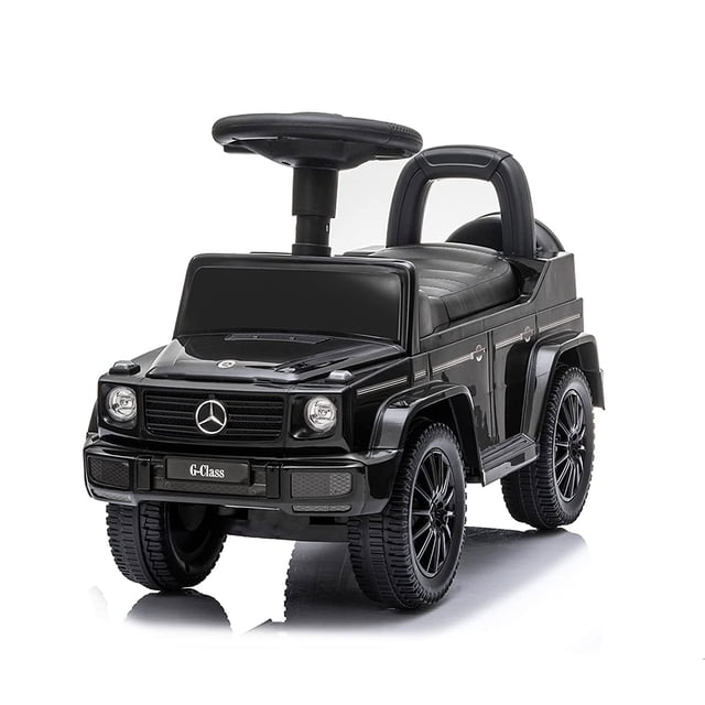 Best Ride On Cars Children's Realistic Mercedes G-Wagon Push Car in black, featuring a child-sized seat with a high backrest, realistic steering wheel, built-in horn, music sounds, and simulated taillights. The push car includes hidden storage under the seat and a foot-to-floor design for safety. Suitable for children ages 1 to 3 years old, with a 55-pound weight capacity. Dimensions are 26 x 12.4 x 13.5 inches.