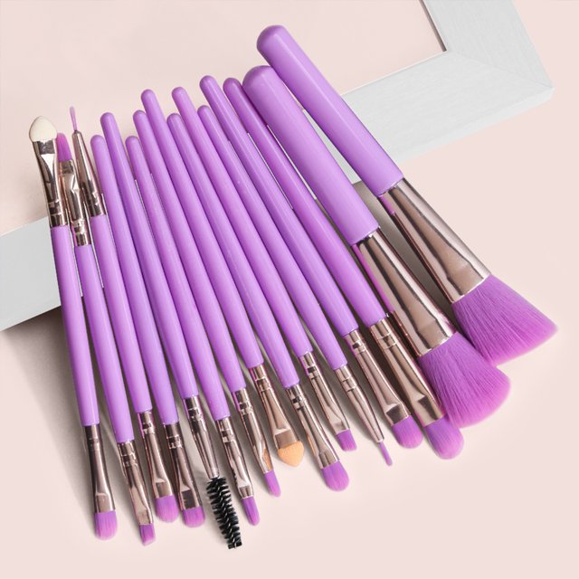 A Set Makeup Cosmetic Face Foundation Power Eyeshadow Make Up Brush featuring a multicolor makeup brush set for women. Includes various brushes with soft bristles and long handles, designed for foundation, blush, eyeshadow blending, and more. The brushes have a vibrant purple color and metallic accents, suitable for professional and personal use.