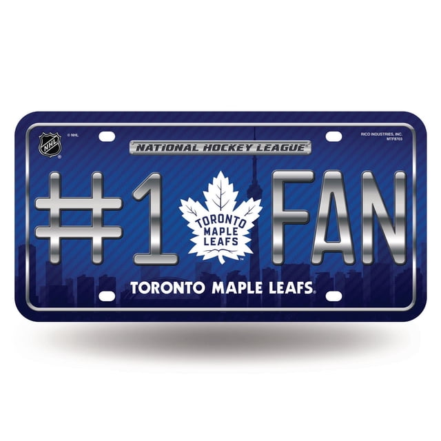 NHL Toronto Maple Leafs License Plate measuring 6 by 12 inches, made of durable metal with a high gloss vinyl finish. It features a blue background with a subtle city skyline, large silver embossed '#1 FAN' text, and the white Toronto Maple Leafs logo centered. Pre-drilled holes allow easy mounting, suitable for vehicle decoration or fan spaces.