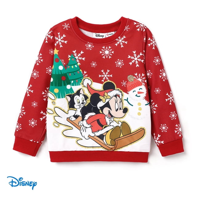 Disney Mickey Mouse Chandail Molletonné à Enfiler pour Tout-Petites Filles en Rouge, Présentant un Motif Festif de Noël avec Minnie Mouse Traînant aux Côtés d'Un Bonhomme de Neige et d'Un Sapin de Noël. le Haut à Col Rond Est Orné de Motifs de Flocons de Neige Blancs, Convient aux Tout-Petites Filles de 2 à 6 Ans.