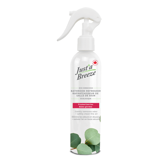 Just'a Breeze Bathroom Refresher Frosted Berries 220ml spray bottle with white trigger nozzle, eco-conscious water-based formula that quickly neutralizes odors and cleans air, featuring green eucalyptus leaves graphic and bilingual English-French label, suitable for bathroom and room spray use.