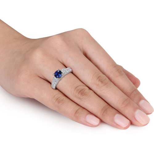 Bague de fiançailles Tangelo avec 1.67 carat de saphir bleu et blanc synthétique en argent sterling