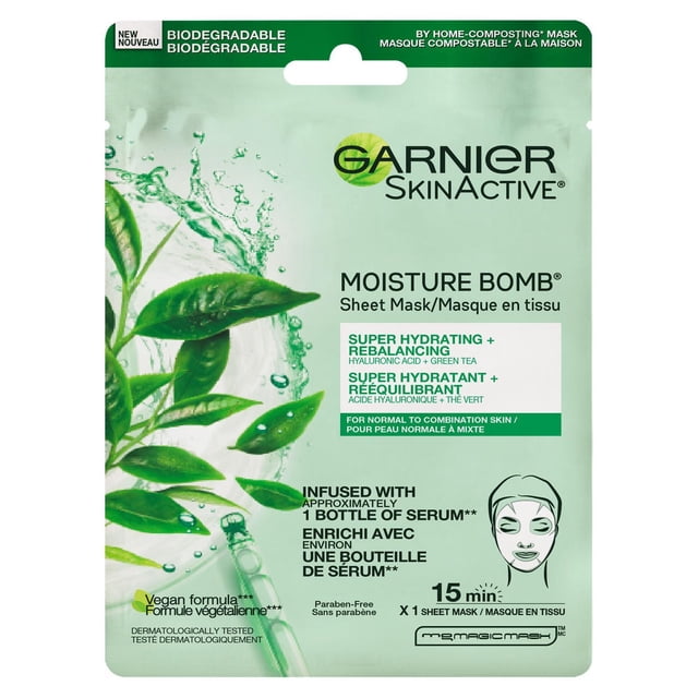 Garnier SkinActive Moisture Bomb sheet mask packaging with green tea leaves and water splash graphics, highlighting super hydrating and rebalancing formula with hyaluronic acid and green tea for normal to combination skin, biodegradable and home-compostable, infused with one bottle of serum, paraben-free, designed for 15-minute use.