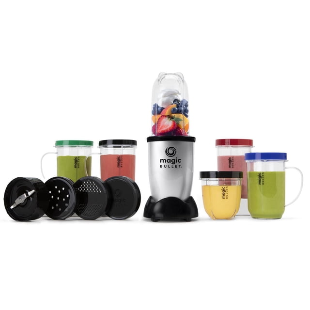 Magic Bullet 17-Piece Blender with silver power base and black trim, featuring a tall blending cup filled with mixed fruit, two additional cups, four mugs with coloured lids and comfort lip rings, and four black blade and accessory attachments on a white background. Ideal for chopping, blending, and mixing ingredients quickly.