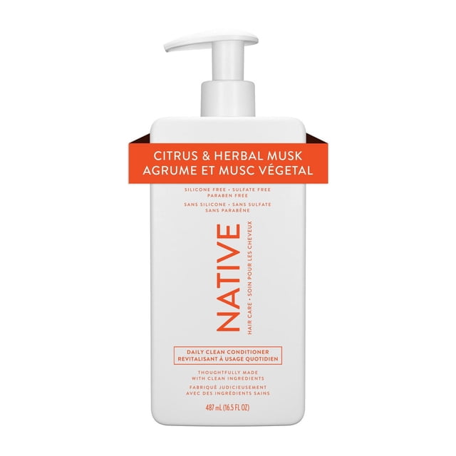 Native Daily Clean Citrus & Herbal Musk Conditioner in a white rectangular pump bottle with orange text, 487 ml (16.5 fl oz), sulfate-free, paraben-free, and silicone-free formula for daily hair care, infused with a citrus and herbal musk scent to revitalize hair without stripping moisture.