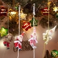 thumbnail image 4 of REK Novelty Climbing Santa Design: This Christmas Tree Ornament Features A Playful Santa Climbing On A Rope Adding A Whimsical And Unique To Your Holiday De Cor. The Funny, 4 of 6