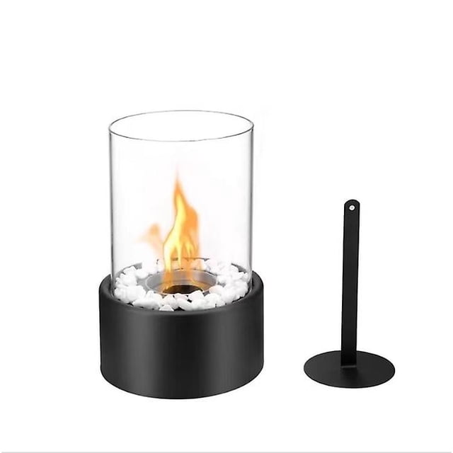 Bioethanol Tabletop Fireplace Bio Ethanol Table Top Fire Round Copper black with a freestanding design, featuring a cylindrical tempered glass enclosure and a black powder-coated metal base. Includes marble stones and a fire damper for safe use. Suitable as a fireplace insert for indoor and outdoor spaces, providing a cosy atmosphere with real flames. Dimensions: 27cm height and 16cm diameter. Compatible with bioethanol fuel.