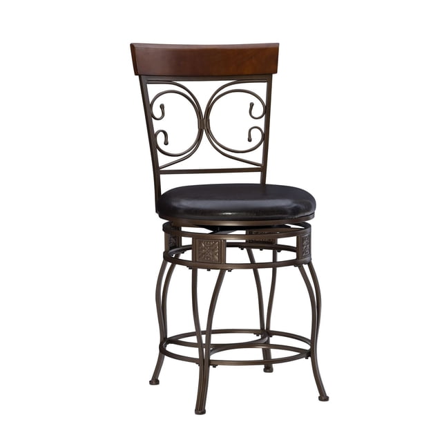 Oswald Big & Tall Counter Stool with dark bronze metal frame featuring decorative scrollwork on the backrest and embossed square panels on the circular footrest. It has a cushioned dark brown faux leather seat, warm brown stained rubberwood top rail, 360-degree swivel, and supports up to 400 pounds, designed for counters 34 to 36 inches high.