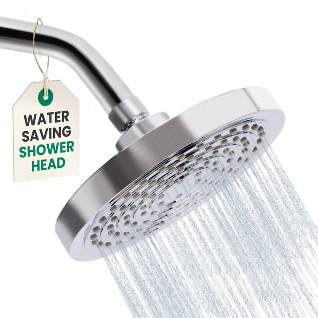 Winthorpe Rain Shower Head - High Pressure 1.8 GPM Low Flow Rate - Water Saving - Chrome. A close-up view of the chrome-finished shower head with 90 adjustable water jets releasing a voluminous spray. The attached tag highlights its water-saving feature. Designed for a luxurious spa-like experience and easy tool-free installation.