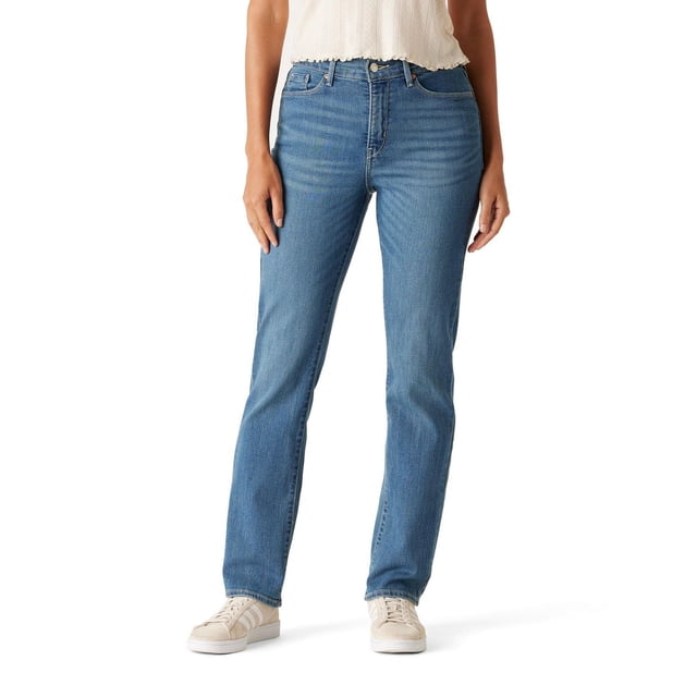 Levi Strauss Signature™ Women's Mid Rise Straight Jeans in classic blue denim with a slim fit through the hip and thigh, mid-rise waist, zip fly, and five-pocket design, shown front-facing on a model wearing beige sneakers and a white sleeveless top, suitable for casual everyday wear.