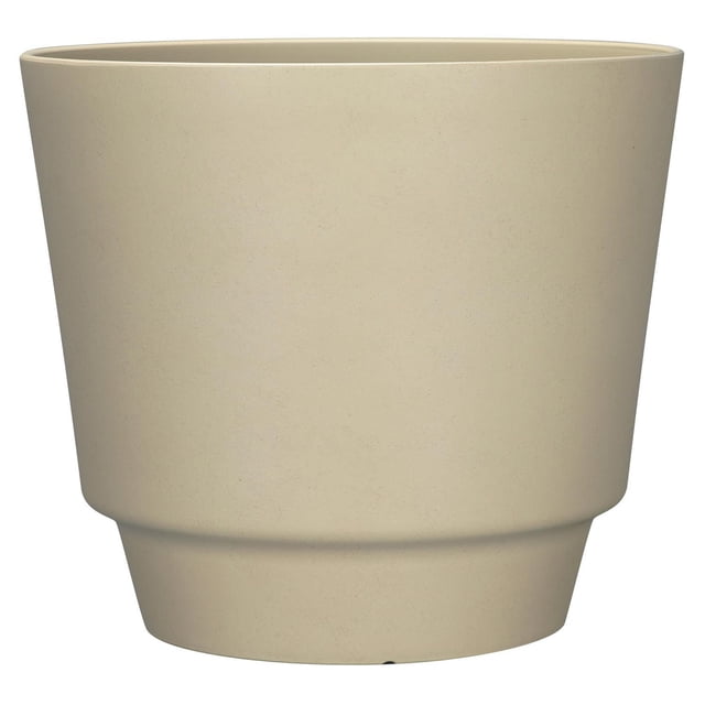 16 in. Calais Planter in beige with a smooth, tapered design made from recycled materials, lightweight and weather resistant, featuring easy knock-out drainage holes for simple plant care, suitable for balconies, patios, or indoor garden spaces.