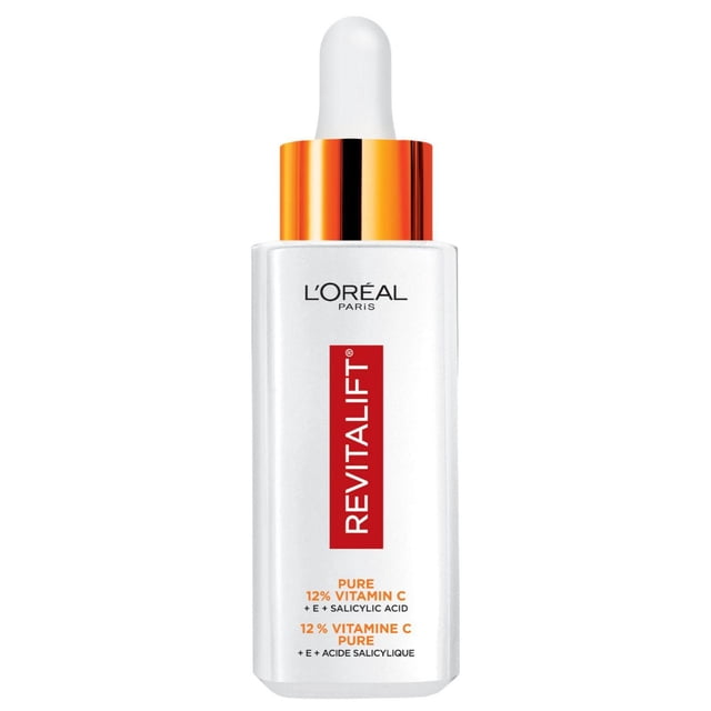 Vitamin C Serum L'Oréal Paris Revitalift in a white rectangular bottle with an orange metallic collar and white dropper cap, labeled with 12% pure vitamin C, vitamin E, and salicylic acid, designed to brighten skin and reduce pores, suitable for all skin types.
