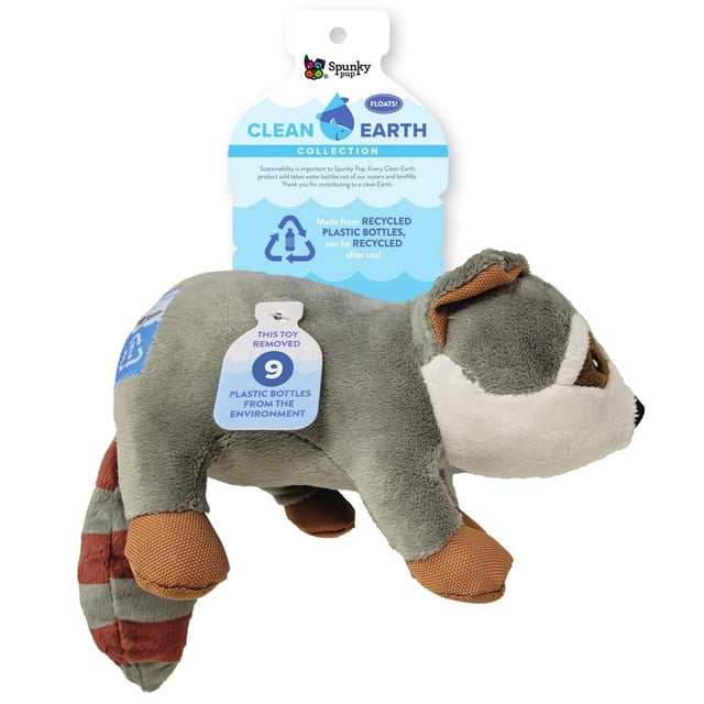 Clean Earth Plush Raccoon dog toy made from 100% recycled plastic bottles, featuring a grey and brown plush raccoon with textured paws and striped tail, part of Spunky Pup's eco-friendly collection that floats and includes a squeaker, with a hang tag showing 9 plastic bottles removed from the environment, ideal for sustainable pet play.