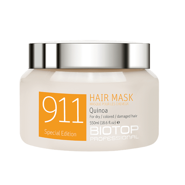 Biotop - 911 Special Edition Hair Mask Quinoa in a 550ml (18.6 fl oz) jar with a sleek silver lid. The label highlights its suitability for dry, colored, or damaged hair, enriched with quinoa extract, macadamia oil, and vitamin E for hydration and repair. Designed for all hair types, including wigs and extensions, and free from parabens, sodium chloride, and SLS/SLES.