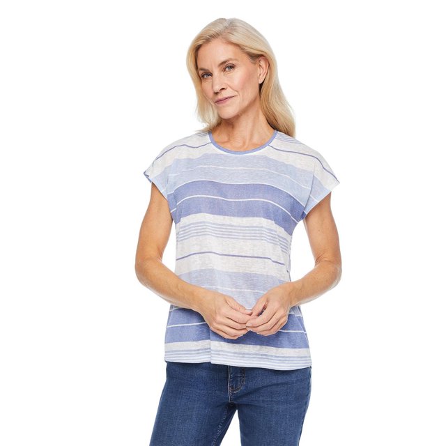 Iyla Women's Button Back Tee with blue and white horizontal stripes, crew neckline, short raglan sleeves, back button details trailing down the spine, and a split high-low hem, shown front-facing worn with dark blue jeans.