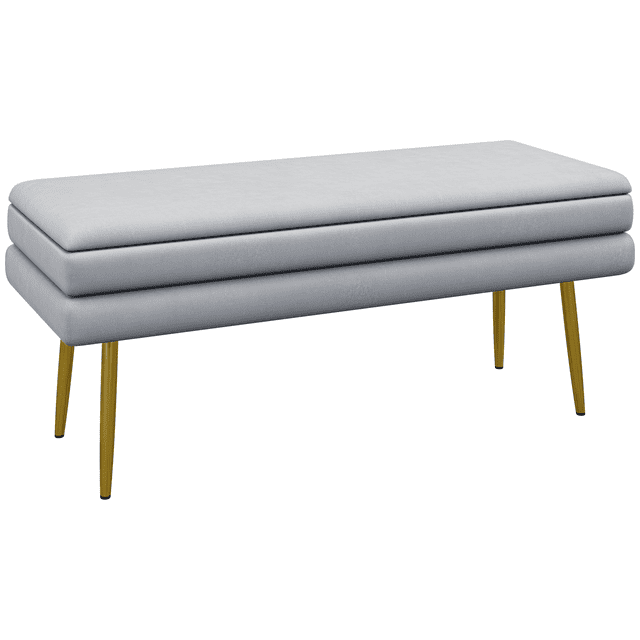 HOMCOM End of Bed Bench, Upholstered Bedroom Bench with Storage in dark grey. This rectangular bench features a velvet-feel polyester surface with thick foam padding for comfort. It includes a hidden storage compartment under the seat, supported by gold-tone electroplated steel legs with non-slip footpads for stability and floor protection. Dimensions are 39.4 inches wide, 14.8 inches deep, and 16.5 inches high. Suitable for use as an end of bed bench, window bench, or entryway bench.