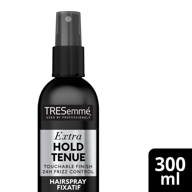 TRESemmé Unscented Extra Hold Hairspray in a black matte spray bottle with a silver label stating extra hold, touchable finish, and 24-hour frizz control, providing professional-quality humidity and frizz protection for long-lasting hair styling.