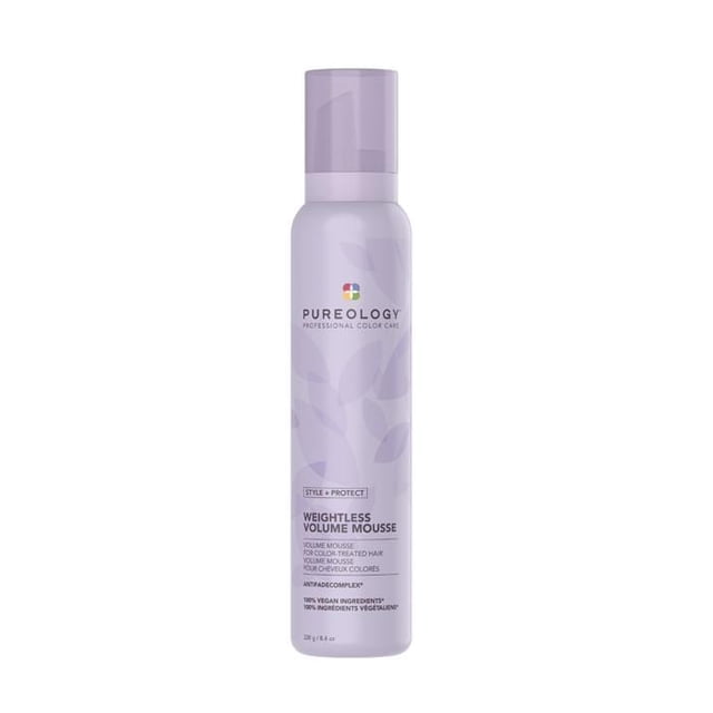 Pureology Weightless Volume Mousse in a 200ml lavender-colored bottle with a sleek design. The mousse is silicone-free, sulfate-free, and 100% vegan, offering weightless volume, heat protection, and shine for color-treated hair. Features an aromatherapy blend of tuberose, almond milk, and cedarwood, with an antifade complex to protect color vibrancy. The bottle displays the Pureology logo and product details.