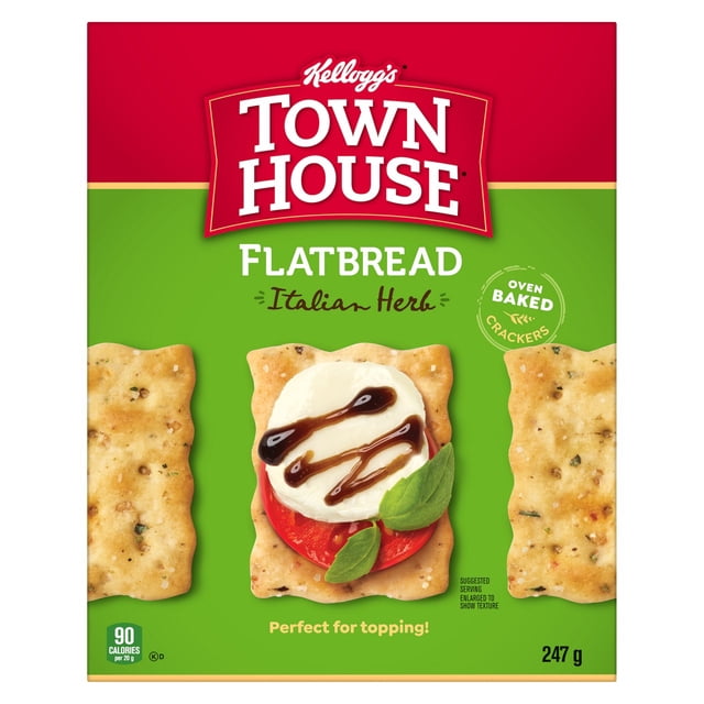 Town House Flatbread Italian Herb 247gm package featuring three rectangular oven-baked Italian herb crackers on a green and red background, one topped with tomato, mozzarella, basil, and balsamic glaze, ideal for Italian food toppings or snacks.