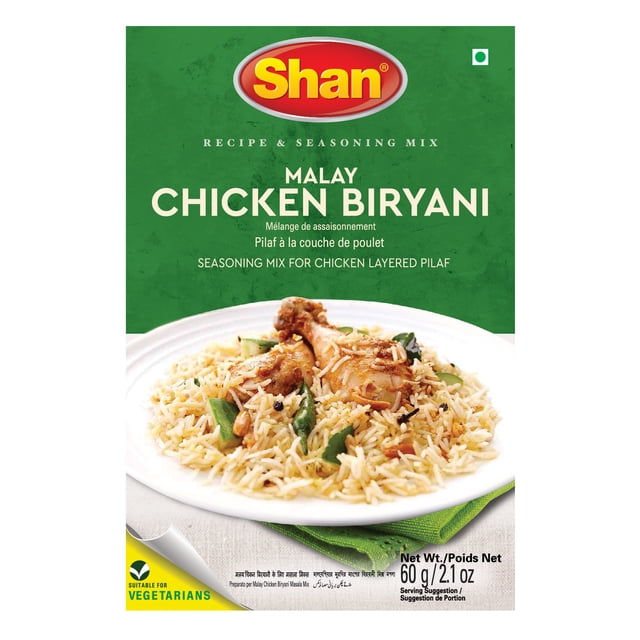 Shan Malay Chicken Biryani Seasoning Mix 60g package with green background and Shan logo, featuring a plate of chicken layered pilaf with turmeric, garlic, and aromatic spices as serving suggestion, suitable for vegetarians and ideal for authentic Indian biryani flavor.