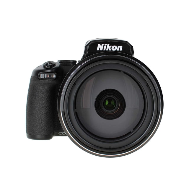Nikon COOLPIX P1100 Superzoom Digital Camera in black, featuring a 125x optical zoom lens with image stabilization, 16 MP resolution, 4K Ultra HD video recording, and Wi-Fi connectivity. The camera includes a rotating LCD screen, RAW format support, and versatile shooting modes such as bird-watching and macro close-ups. Front-facing view highlights the large lens and compact design.
