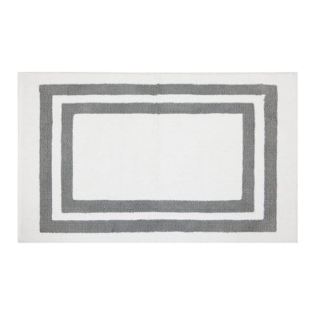 hometrends Grey and White Double Racetrack 2 Piece Bath Rug Set with a rectangular white bath rug featuring two grey racetrack borders, made of 100% polyester with a soft texture and slip-resistant rubber backing, measuring 20 in. x 34 in., ideal for bathroom comfort and absorbency.