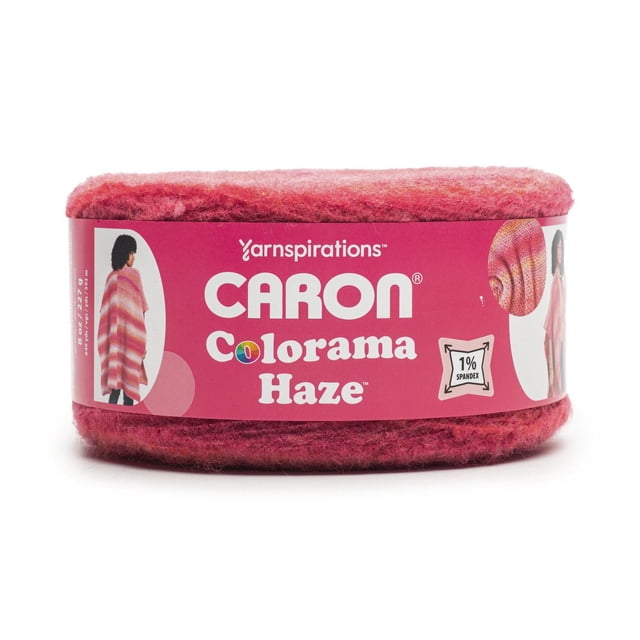 Caron® Colorama Haze™ Yarn, bulky #4 medium weight acrylic blend with 1% spandex, 8oz/227g skein containing 649 yards in variegated pink and red hues, ideal for knitting and crochet projects like shawls and sweaters with soft texture and seamless color transitions.