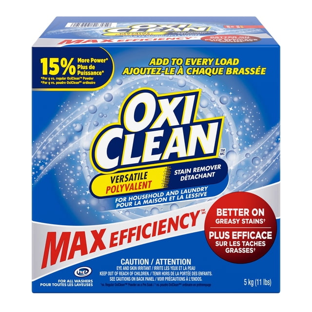 OxiClean Max Efficiency Stain Remover, 5 kg box designed for household laundry. The chlorine-free and bleach-free formula works with all washing machines, including HE, and handles up to 275 loads. The packaging emphasizes its effectiveness on greasy stains and versatility as a laundry additive.