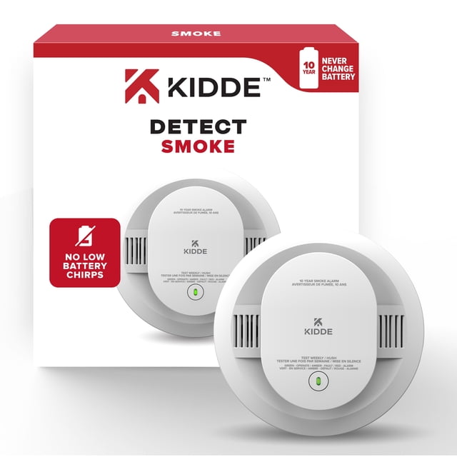 Kidde Smoke Alarm with 10 year sealed lithium battery shown with its white and red packaging. The round white alarm features a central green-lit test button and side vents, offering reliable home fire safety with no low battery chirps and a 10-year battery life.