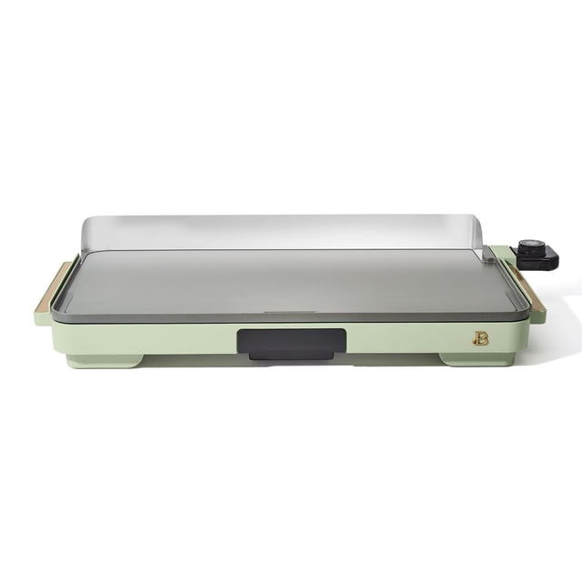 Beautiful XL Electric Griddle, 12" x 22", with a large non-stick cooking surface, detachable stainless steel backsplash, slim sage green base with gold accents, removable heat control dial from 200°F to 400°F, and cool-touch handles for safe handling, suitable for family meals and easy cabinet storage.