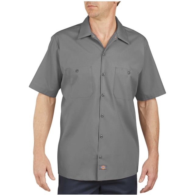 Dickies Mens Industrial Short Sleeve Work Shirt in size L and Graphite Gray color. This rugged work shirt features a button-up front, two chest pockets with button closures, and a pointed collar. Made from a durable poly/cotton poplin blend, it resists wrinkling and fading, making it ideal for industrial laundering. The shirt is designed for comfort and a sharp appearance, suitable for demanding work environments.
