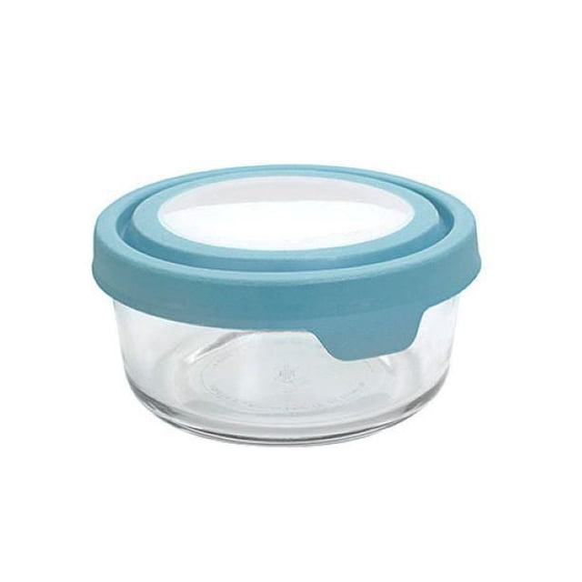 Anchor Hocking 2CUP RND FOOD STOR W/TRUESEAL MINERAL BLUE LID is a 2-cup round tempered glass container with a mineral blue airtight TrueSeal lid that prevents leaks and locks in freshness. Safe for fridge, freezer, microwave, dishwasher (lid on top rack), and oven up to 425°F. Also suitable for storing small craft supplies or snacks.