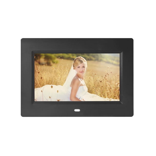 jovati Ultra-Thin Fashion High-Definition LED Electronic Photo Frame Multimedia Advertising Player 7 Inch Digital Photo Frame in black. This 7-inch LED LCD frame offers 800x480 resolution, JPEG photo playback, and MPEG1, MPEG2, MPEG4, and Xvid video support. It features built-in stereo speakers, MP3 and WMA audio playback, and functions like a clock, alarm, and calendar. The frame supports U disk and 4-in-1 card compatibility (SD/MMC/MS/XD) and includes an infrared remote control. Accessories provided are a power supply, stand, remote control, and manual. Dimensions are 20.3x14.2cm (7.99x5.59in).