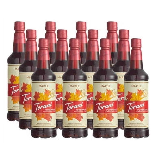 Torani Puremade Maple Flavoring Syrup in a 750 mL plastic bottle, sold in a case of 12. The bottles feature a red cap and a label with maple leaf graphics, highlighting the genuine maple flavor. Ideal for enhancing lattes, cold brew coffee, and frappes, this syrup is made with pure cane sugar and contains no artificial colors, flavors, or preservatives.
