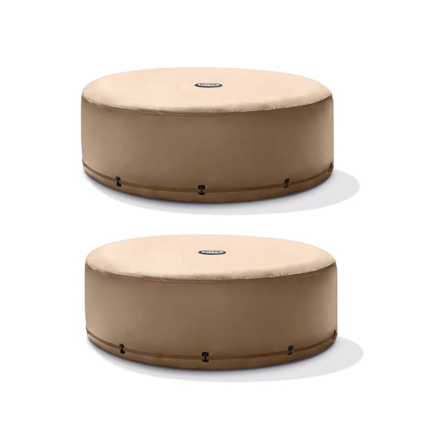 Intex Housse de Remplacement Ronde Écoénergétique pour Spa pour 4 Personnes Seulement (Lot de 2) de Couleur Beige, compatible avec les Modèles Ronds de Massage à Bulles Intex pour 4 Personnes. Chaque Housse Mesure 78 x 78 x 28,38 Pouces et Est Fabriquée en Matériau PVC durable. Conçue pour Conserver la Chaleur et Économiser l'Énergie, Ces Housses Protégent le Spa de la Saleté et des Débris Lorsqu'il n'Est Pas Utilisé. l'Image Montre Deux Housses Identiques Empilées, Soulignant Leur Fonctionnalité et l'Efficacité Énergétique