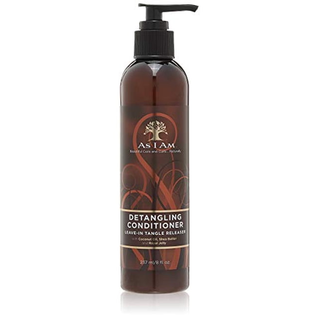 As I Am Revitalisant Démêlant Sans Rinçage, Bouteille de 8 fl oz avec Distributeur à Pompe. Cet Revitalisant Sans Rinçage Présente une Formule Riche avec Beurre de Karité, Huile de Noix de Coco et Gelée Royale, Conçu pour Hydrater, Renforcer et Démêler les Cheveux. Idéal pour les Cheveux à Texture Naturelle, Il Aide à Réduire la Casse et Favorise la Brillance. la Bouteille Brune Élégante Affiche le logo de la Marque et les Détails du Produit.